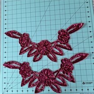 Fuchsia sequin and bead flower neckline applique